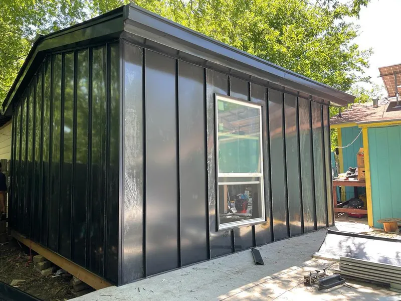 Black standing seam metal wall panels for Roof Inspection in Shiprock