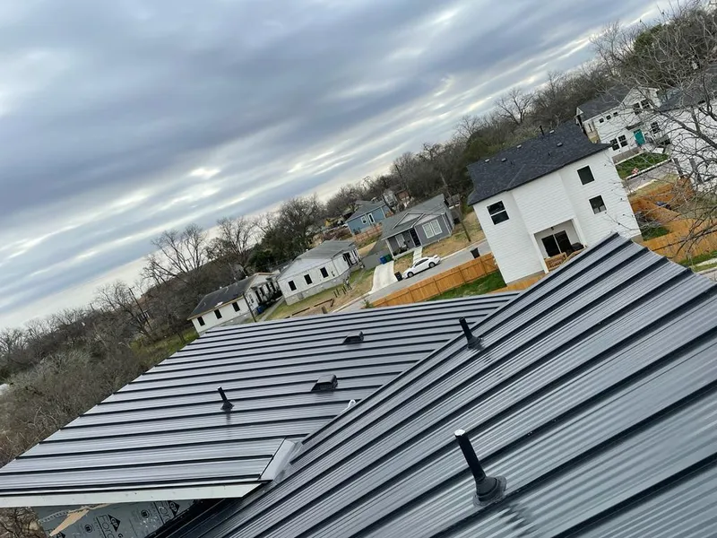 Standing seam metal roof panels with vents for Skylight Repair in Shiprock